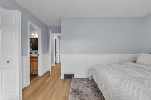1318 Whitfield Avenue, Crossfield, AB - Indoor Photo Showing Bedroom