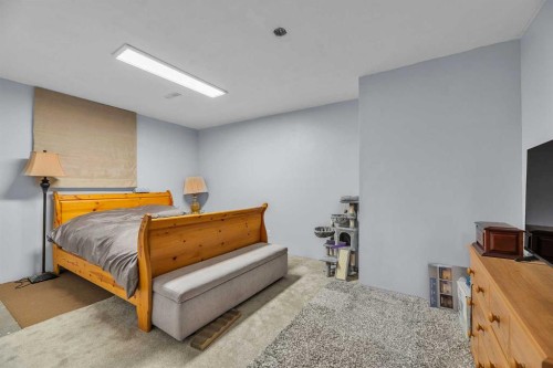 1318 Whitfield Avenue, Crossfield, AB - Indoor Photo Showing Bedroom