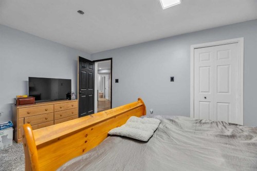 1318 Whitfield Avenue, Crossfield, AB - Indoor Photo Showing Bedroom