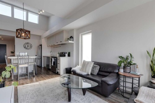 406-730 5 Street Ne, Calgary, AB - Indoor Photo Showing Living Room