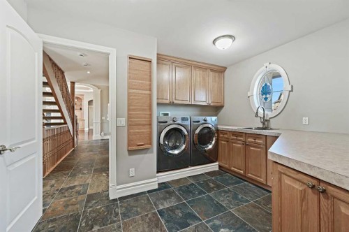 1 Pinehurst Drive, Heritage Pointe, AB - Indoor Photo Showing Laundry Room