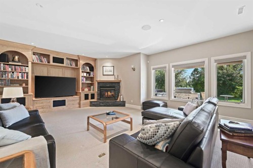 1 Pinehurst Drive, Heritage Pointe, AB - Indoor Photo Showing Living Room With Fireplace