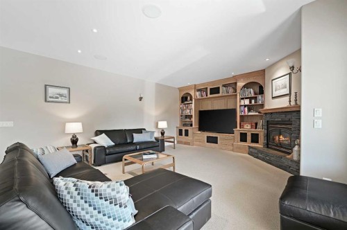 1 Pinehurst Drive, Heritage Pointe, AB - Indoor Photo Showing Living Room With Fireplace