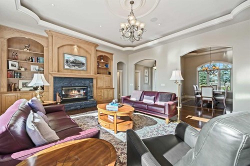 1 Pinehurst Drive, Heritage Pointe, AB - Indoor Photo Showing Living Room With Fireplace