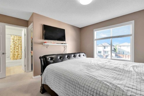 175 Evansmeade Common Nw, Calgary, AB - Indoor Photo Showing Bedroom