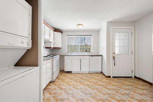 703 130 Avenue Sw, Calgary, AB - Indoor Photo Showing Laundry Room