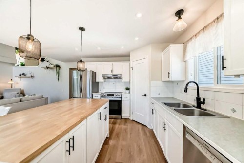 132 Hidden Valley Crescent Nw, Calgary, AB - Indoor Photo Showing Kitchen With Double Sink With Upgraded Kitchen
