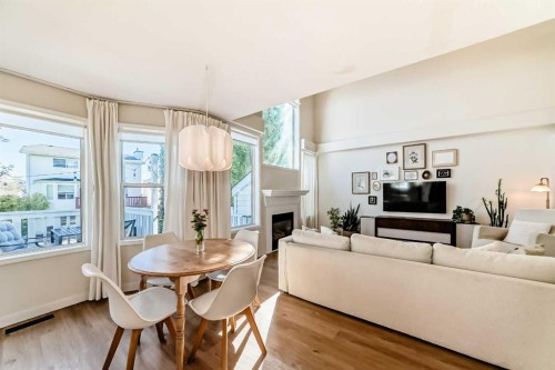 132 Hidden Valley Crescent Nw, Calgary, AB - Indoor Photo Showing Other Room With Fireplace