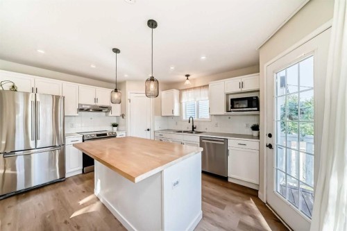132 Hidden Valley Crescent Nw, Calgary, AB - Indoor Photo Showing Kitchen With Upgraded Kitchen