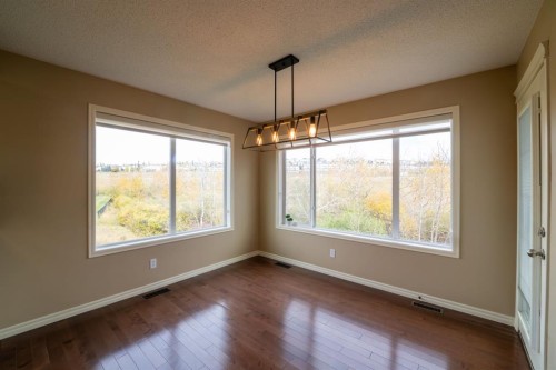 150 Tuscany Summit Heath Nw, Calgary, AB - Indoor Photo Showing Other Room