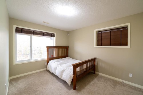 150 Tuscany Summit Heath Nw, Calgary, AB - Indoor Photo Showing Bedroom