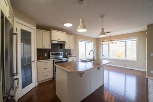 150 Tuscany Summit Heath Nw, Calgary, AB - Indoor Photo Showing Kitchen With Stainless Steel Kitchen With Double Sink