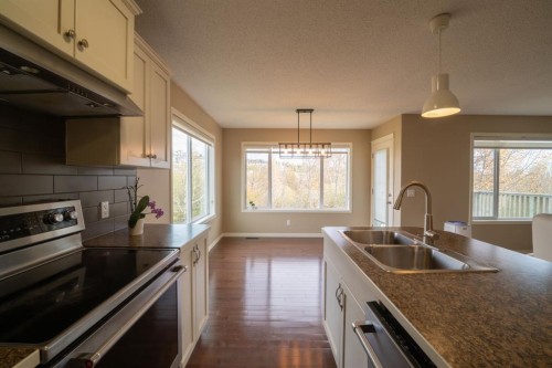 150 Tuscany Summit Heath Nw, Calgary, AB - Indoor Photo Showing Kitchen With Stainless Steel Kitchen With Double Sink