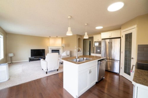 150 Tuscany Summit Heath Nw, Calgary, AB - Indoor Photo Showing Kitchen With Stainless Steel Kitchen With Double Sink With Upgraded Kitchen