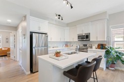 1001-250 Fireside View  Cochrane, AB T4C 2M2