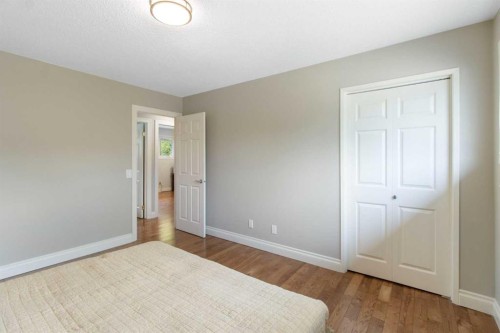 152 Lake Mead Crescent Se, Calgary, AB - Indoor Photo Showing Bedroom