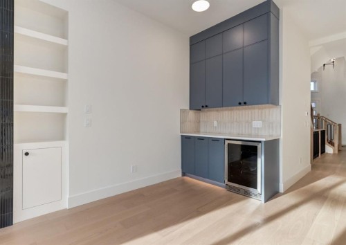 507 26 Avenue Ne, Calgary, AB - Indoor Photo Showing Other Room With Fireplace