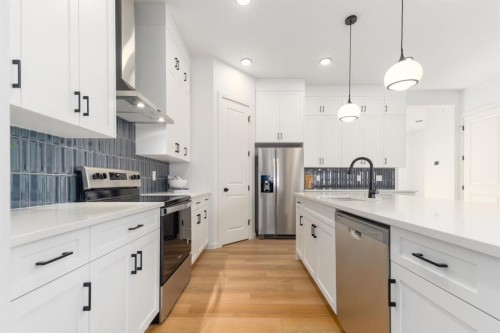 80 Creekside Path Sw, Calgary, AB - Indoor Photo Showing Kitchen With Stainless Steel Kitchen With Upgraded Kitchen