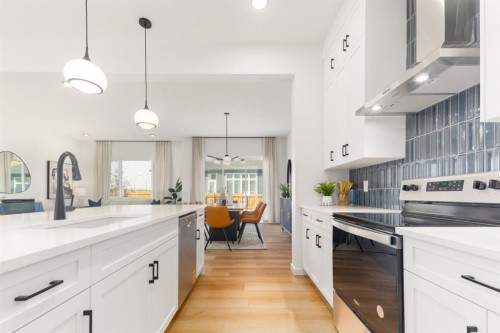 80 Creekside Path Sw, Calgary, AB - Indoor Photo Showing Kitchen With Upgraded Kitchen