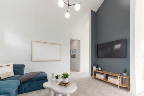 80 Creekside Path Sw, Calgary, AB - Indoor Photo Showing Living Room