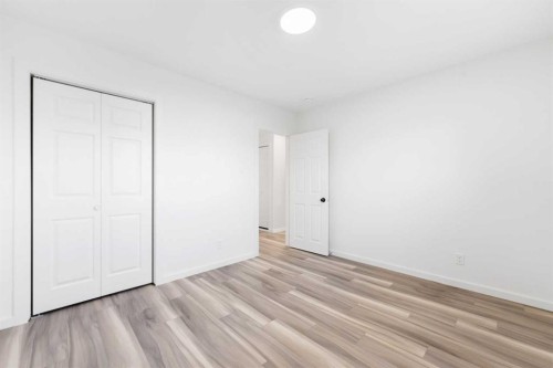 28 Henefer Road Sw, Calgary, AB - Indoor Photo Showing Other Room