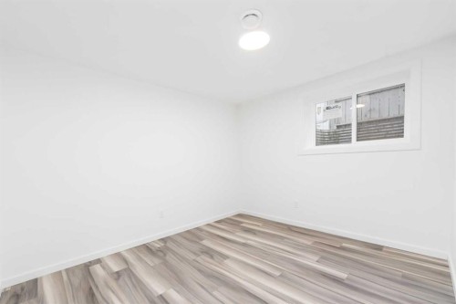 28 Henefer Road Sw, Calgary, AB - Indoor Photo Showing Other Room