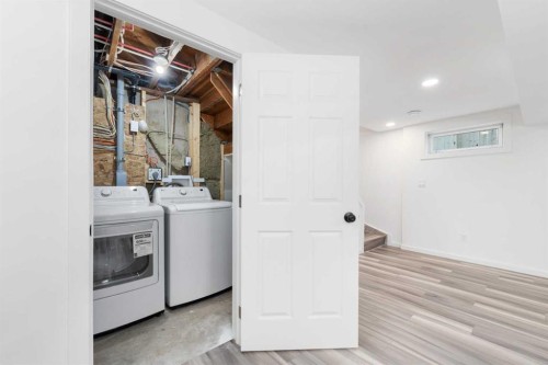 28 Henefer Road Sw, Calgary, AB - Indoor Photo Showing Laundry Room