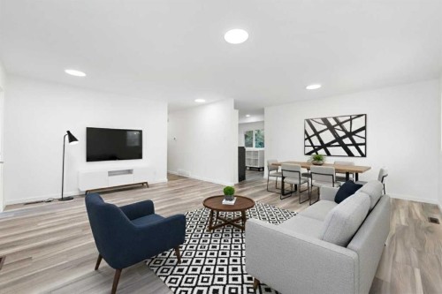 28 Henefer Road Sw, Calgary, AB - Indoor Photo Showing Living Room