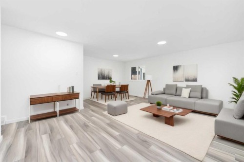 28 Henefer Road Sw, Calgary, AB - Indoor Photo Showing Living Room