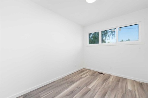 28 Henefer Road Sw, Calgary, AB - Indoor Photo Showing Other Room