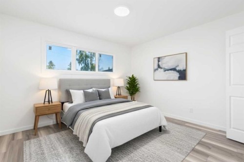 28 Henefer Road Sw, Calgary, AB - Indoor Photo Showing Bedroom