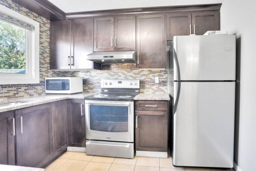 120 Tararidge Close Ne, Calgary, AB - Indoor Photo Showing Kitchen