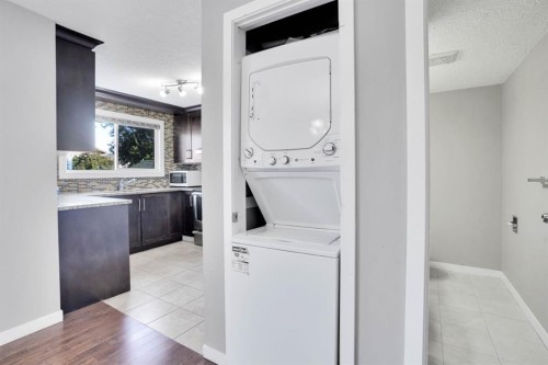 120 Tararidge Close Ne, Calgary, AB - Indoor Photo Showing Laundry Room