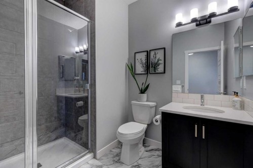 878 Bluerock Way Sw, Calgary, AB - Indoor Photo Showing Bathroom