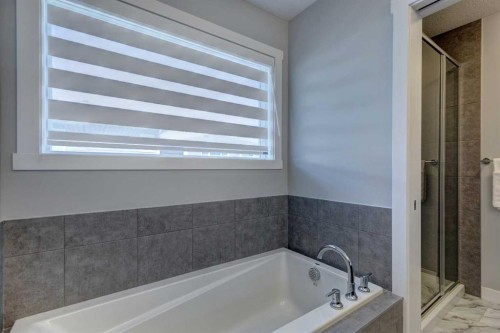 878 Bluerock Way Sw, Calgary, AB - Indoor Photo Showing Bathroom