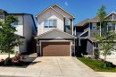878 Bluerock Way Sw, Calgary, AB  - Outdoor With Facade 