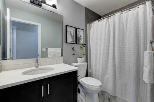 878 Bluerock Way Sw, Calgary, AB - Indoor Photo Showing Bathroom