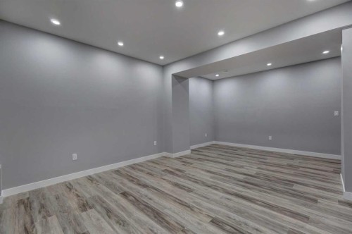 878 Bluerock Way Sw, Calgary, AB - Indoor Photo Showing Other Room