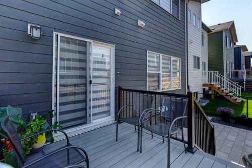 878 Bluerock Way Sw, Calgary, AB - Outdoor With Deck Patio Veranda With Exterior