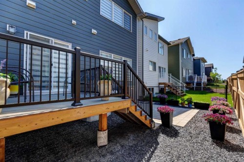 878 Bluerock Way Sw, Calgary, AB - Outdoor With Deck Patio Veranda With Exterior