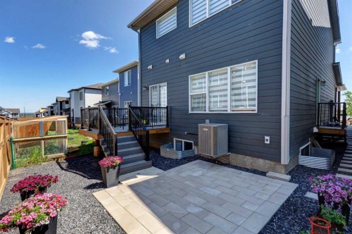 878 Bluerock Way Sw, Calgary, AB - Outdoor With Deck Patio Veranda With Exterior