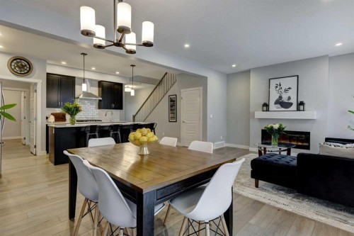878 Bluerock Way Sw, Calgary, AB - Indoor Photo Showing Dining Room