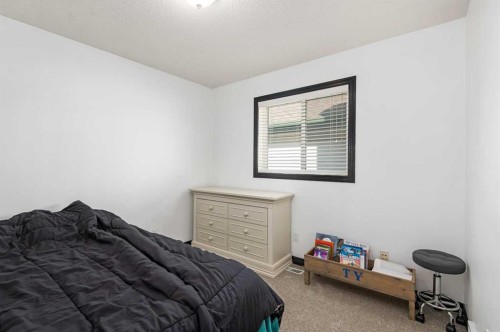 85 Bridlewood Street Sw, Calgary, AB - Indoor Photo Showing Bedroom