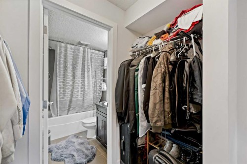 2212-403 Mackenzie Way Sw, Airdrie, AB - Indoor With Storage