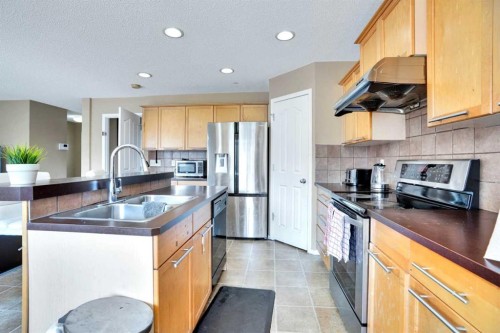 228 Covehaven Terrace Ne, Calgary, AB - Indoor Photo Showing Kitchen With Double Sink