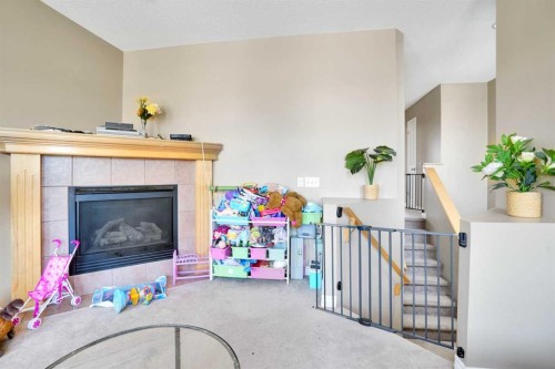 228 Covehaven Terrace Ne, Calgary, AB - Indoor With Fireplace