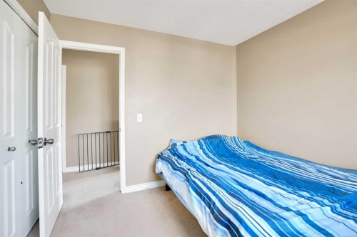 228 Covehaven Terrace Ne, Calgary, AB - Indoor Photo Showing Bedroom
