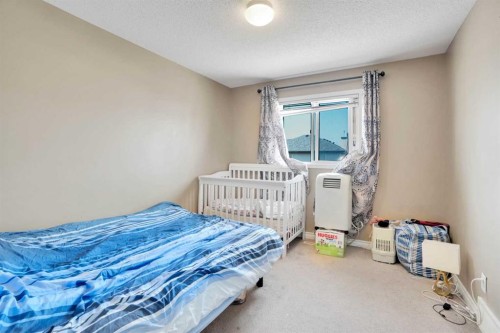 228 Covehaven Terrace Ne, Calgary, AB - Indoor Photo Showing Bedroom