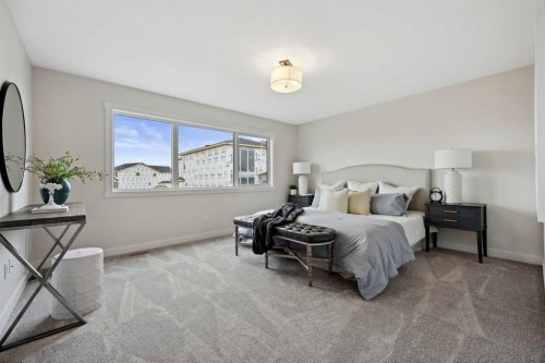 43 Versant View Sw, Calgary, AB - Indoor Photo Showing Bedroom