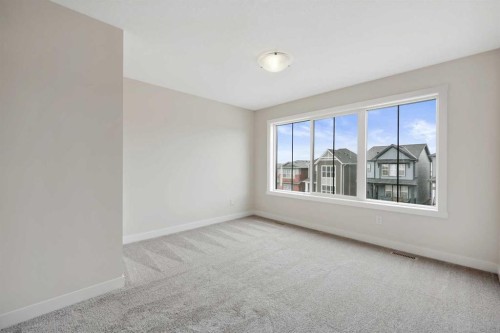 43 Versant View Sw, Calgary, AB - Indoor Photo Showing Other Room